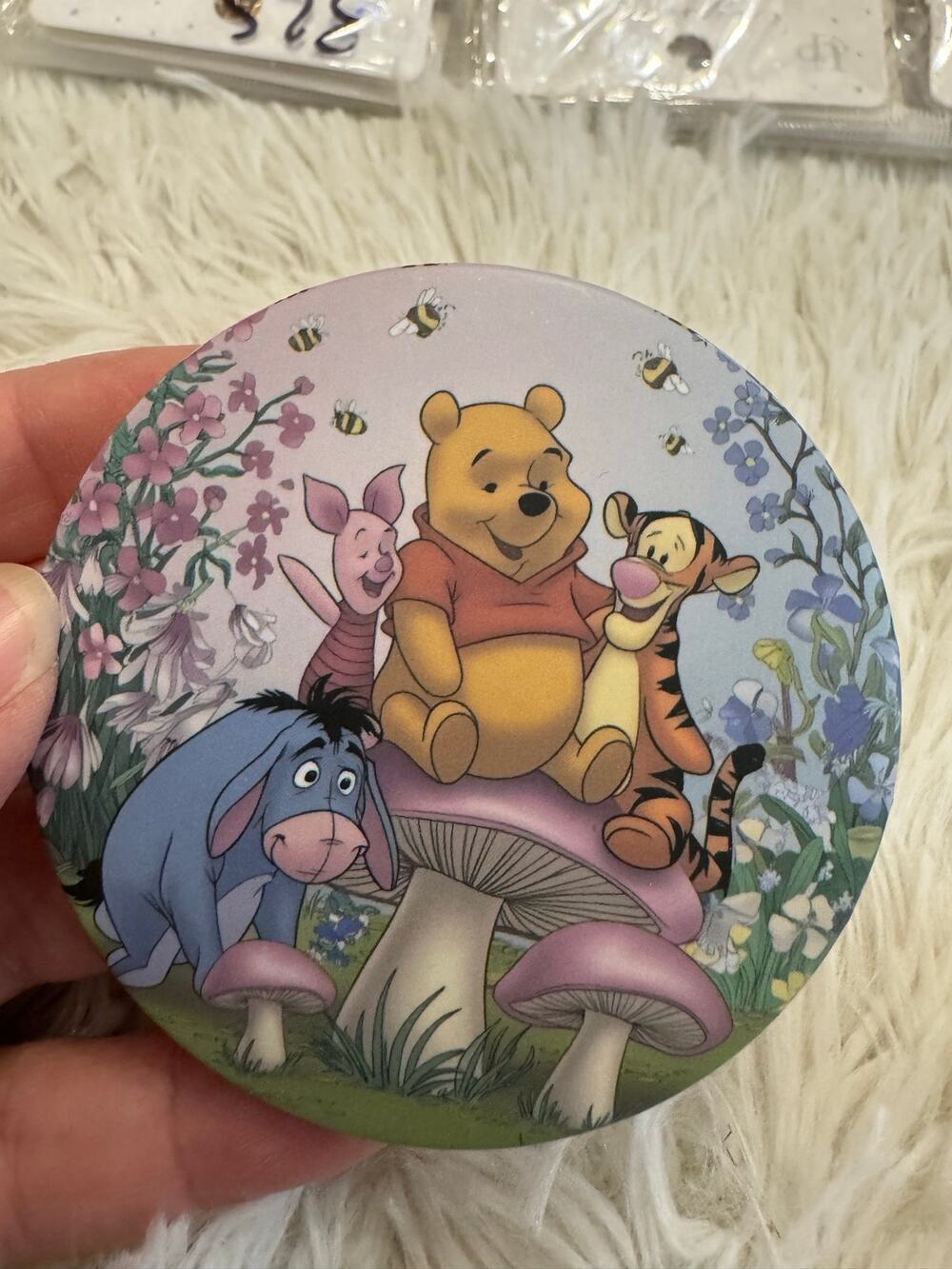 Winnie the Pooh compact mirror with Pooh, Tigger, Piglet, & Eeyore on mushrooms